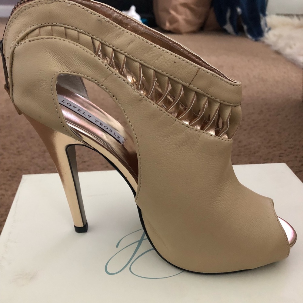 Nude peep toe shoes.  Never worn